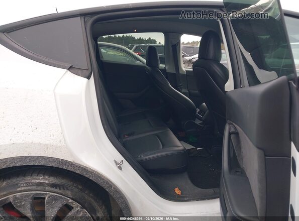 7SAYGDEF7NF308720 2022 TESLA MODEL Y White VIN კოდის სტიკერის ხედი