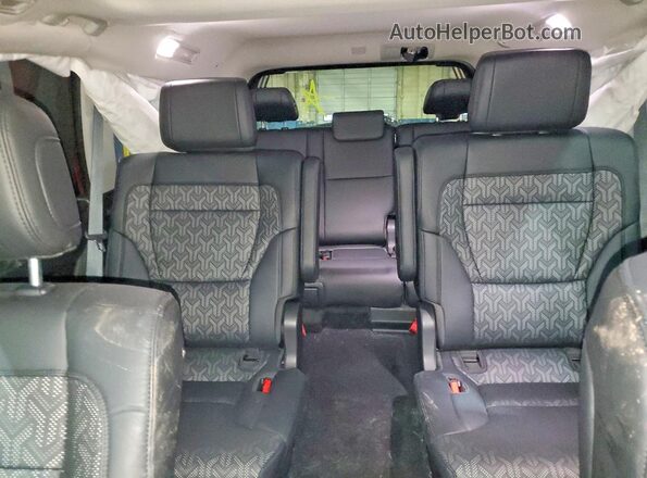 7SVAAABA0RX045057 2024 TOYOTA LIMITED Red Rear seats view