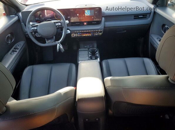 7YAKPDDC1SY009397 2025 HYUNDAI IONIQ Red Widok deski rozdzielczej
