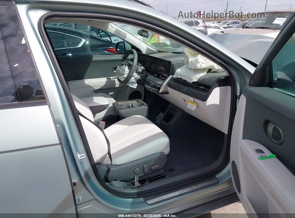 7YAKR4DA2TY055203 2026 HYUNDAI IONIQ 5 Зеленый Вид салона спереди
