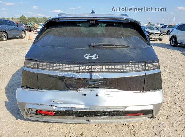 7YAKR4DA3SY010124 2025 HYUNDAI IONIQ Black Rear view