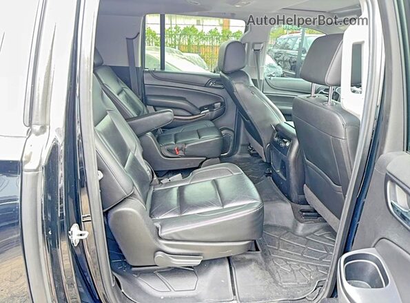 1GNSKHKC9LR249221 2020 CHEVROLET SUBURBAN Черный Вид салона спереди