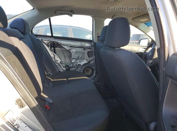 JA32U2FU2GU005026 2016 MITSUBISHI LANCER Silver Rear interior view