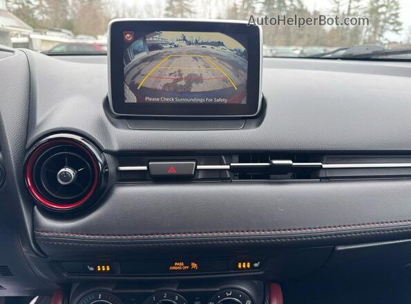 JM1DKBC78G0105203 2016 MAZDA CX-3 Red Widok wnętrza z tyłu