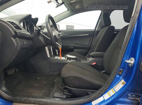 JA32U2FU7HU011390 2017 MITSUBISHI LANCER Синий Вид салона спереди