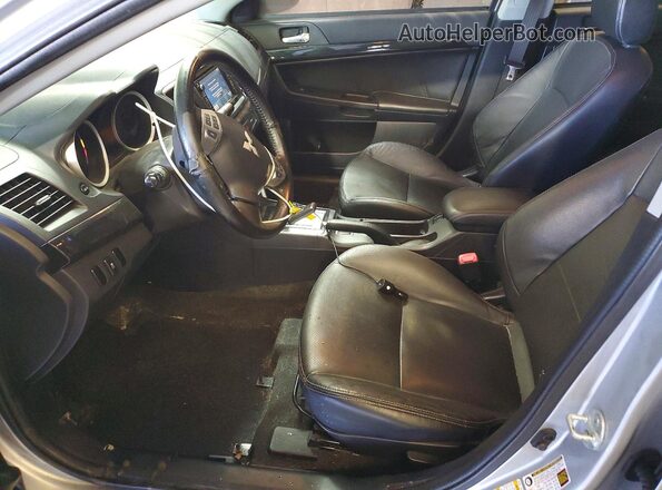 JA32V2FW7GU004839 2016 MITSUBISHI LANCER Серебряный Вид салона спереди