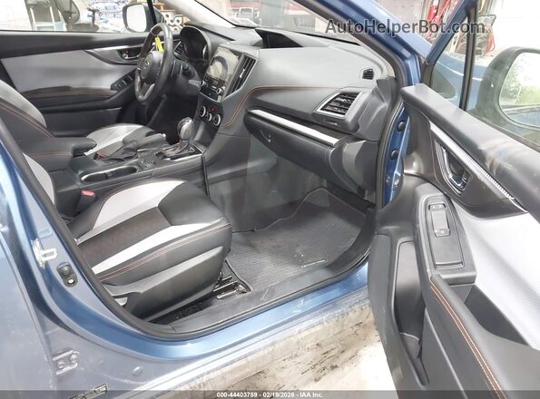 JF2GTHMC1PH242463 2023 SUBARU CROSSTREK Blue Vista interior delantera