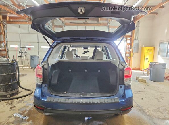 JF2SJABC8JH571582 2018 SUBARU FORESTER 2.5 Blue Rear view