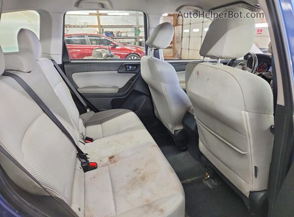 JF2SJABC8JH571582 2018 SUBARU FORESTER 2.5 Blue Rear interior view