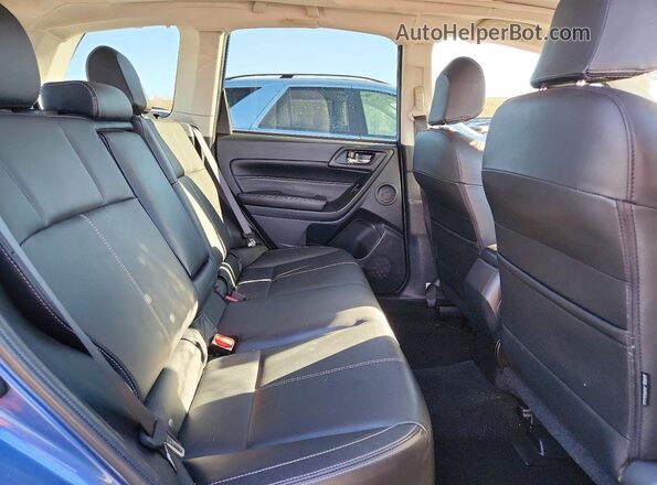 JF2SJAWC4HH454117 2017 SUBARU FORESTER 2.5I TO Blue Vista interior trasera