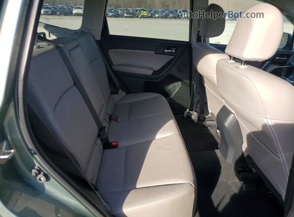JF2SJAXC2GH439533 2016 SUBARU FORESTER 2.5I TO Green Vista interior trasera