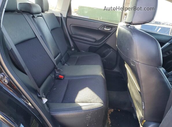 JF2SJGEC1HH476502 2017 SUBARU FORESTER2. Black Rear interior view