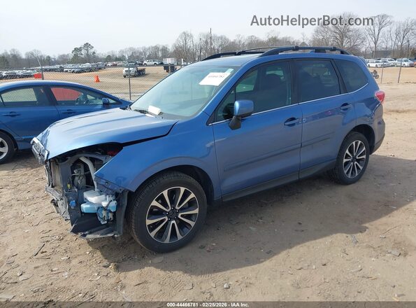 JF2SJGEC3JH414802 2018 SUBARU FORESTER2. Blue Vista tres cuartos delantera izquierda