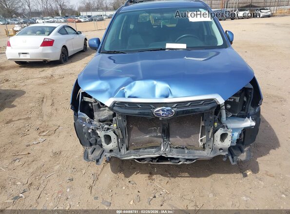 JF2SJGEC3JH414802 2018 SUBARU FORESTER2. Blue Vista frontal
