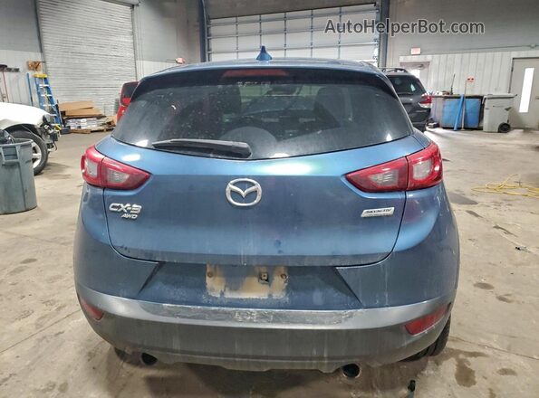 JM1DKFD77J0309875 2018 MAZDA CX-3 Blue Widok z tyłu