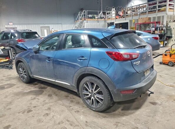 JM1DKFD77J0309875 2018 MAZDA CX-3 Blue Tył lewy