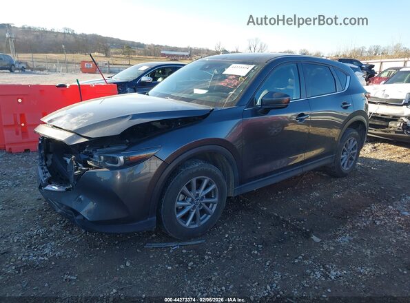 JM3KFBCMXN1568878 2022 MAZDA CX-5 Gray Vista tres cuartos delantera izquierda