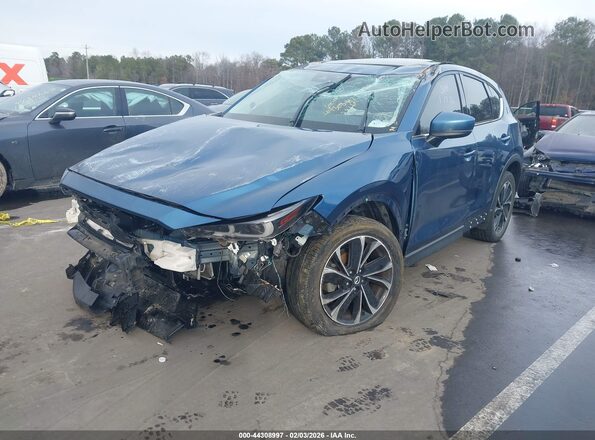 JM3KFBDM6N1607156 2022 MAZDA CX-5 Blue Vista tres cuartos delantera izquierda