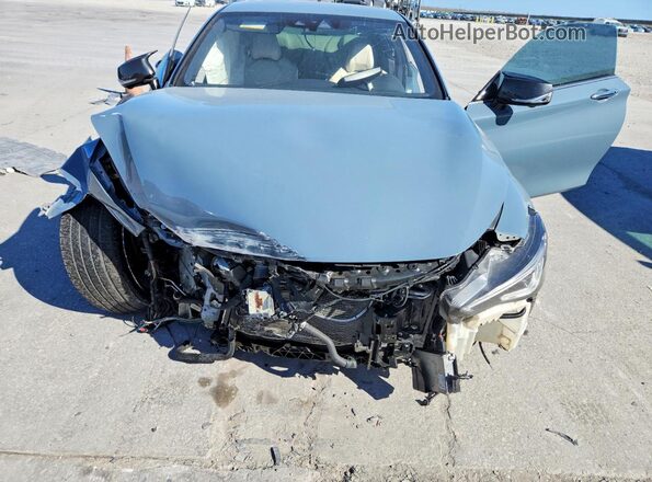 JN1FV7LL1MM560413 2021 INFINITI Q60 Teal Սալոնի հետևի տեսք