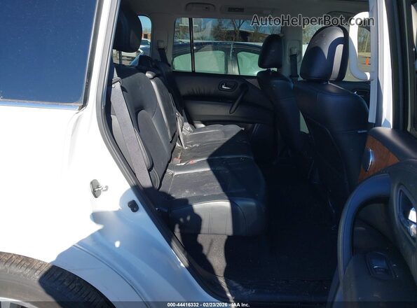 JN8AY2BC9M9145267 2021 NISSAN ARMADA White VIN կոդի պիտակի տեսք