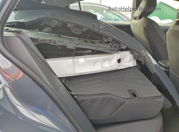 JTDACACU5S3048773 2025 TOYOTA PRIUS Gray Vista de los asientos traseros