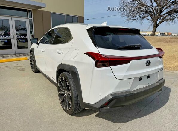 JTHU9JBHXK2019709 2019 LEXUS UX White Delantero derecho