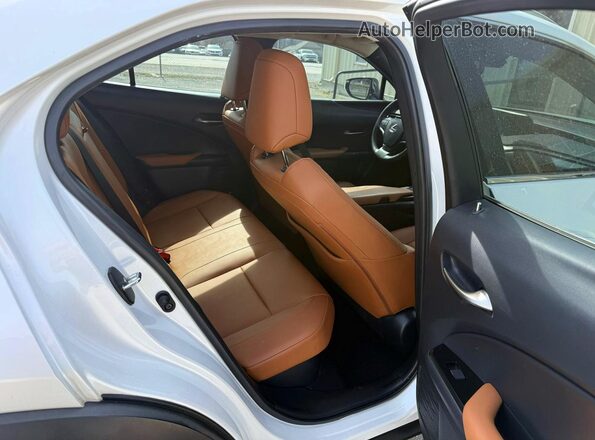 JTHU9JBHXK2019709 2019 LEXUS UX White Vista interior delantera