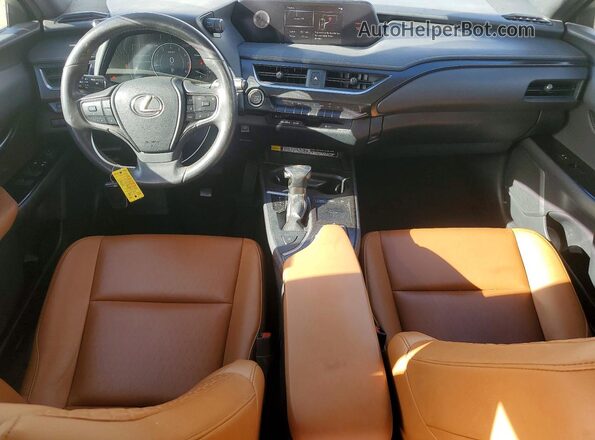 JTHX3JBH0M2038397 2021 LEXUS UX Белый Вид панели приборов