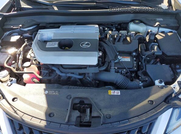 JTHX9JBH2N2059414 2022 LEXUS UX White Вид задньої частини салону