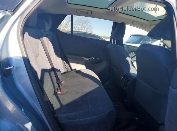 JTJAAAAB0PA011038 2023 LEXUS RZ Gray Вид задньої частини салону