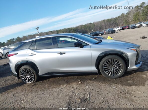 JTJAAAAB4PA006134 2023 LEXUS RZ 450E Серебряный Вид задней части салона