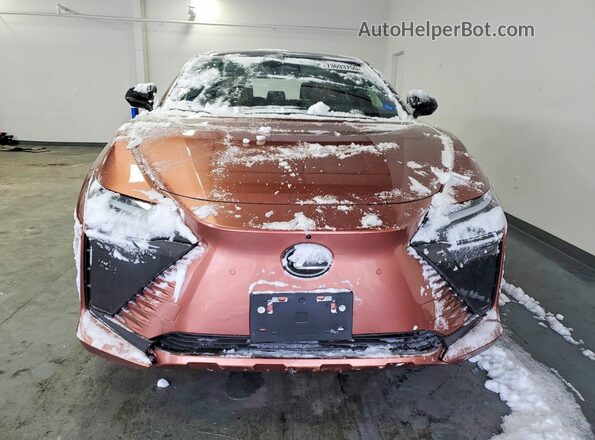 JTJABABB0SA010735 2025 LEXUS RZ Tan Vista frontal