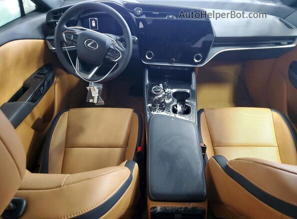 JTJABABB0SA010735 2025 LEXUS RZ Tan Vista del salpicadero