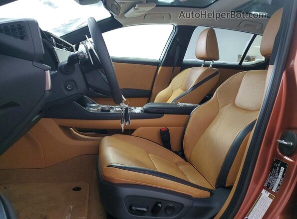 JTJABABB0SA010735 2025 LEXUS RZ Tan Vista interior delantera