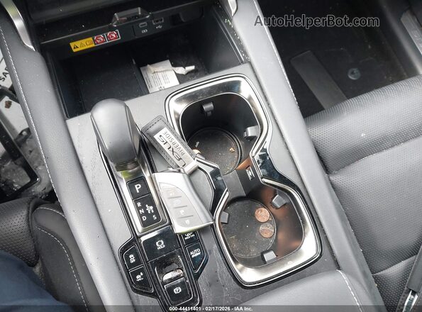 JTJCJMGA0R2014303 2024 LEXUS RX 450H+ Orange Vista del salpicadero