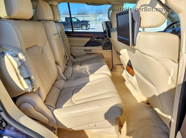 JTJHY7AX2G4187693 2016 LEXUS LX Blue Widok wnętrza z tyłu