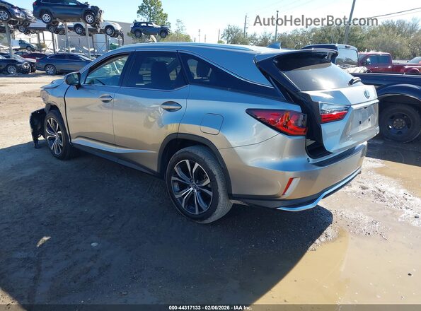 JTJHZKEAXM2019927 2021 LEXUS RX 350L Silver Trasero izquierdo
