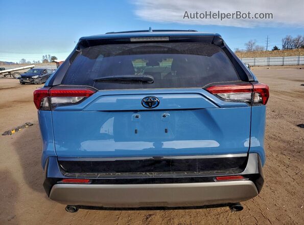 JTM16RFVXND050673 2022 TOYOTA RAV4 Blue Вид ззаду