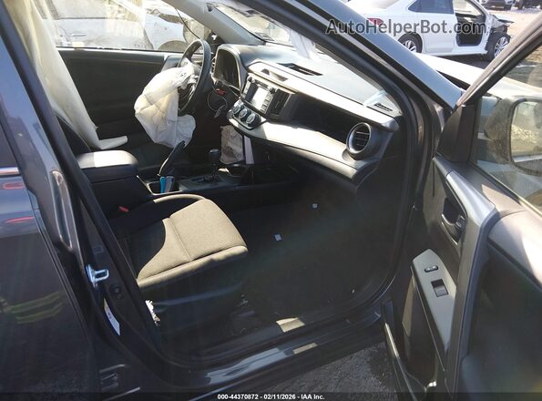 JTMBFREV9HJ156382 2017 TOYOTA LE Gray Vista interior delantera