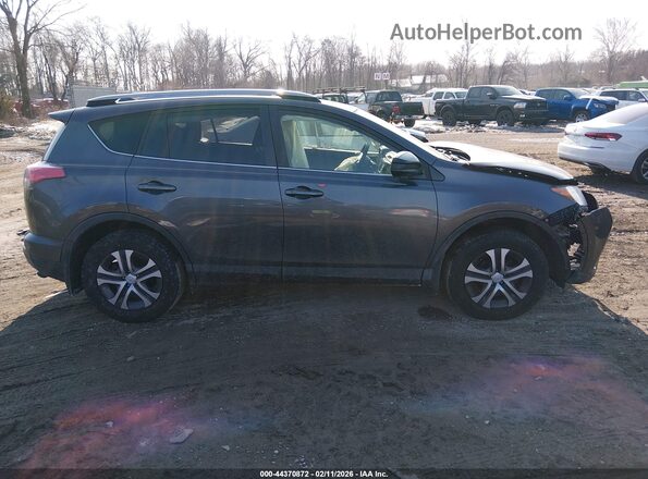 JTMBFREV9HJ156382 2017 TOYOTA LE Gray Vista interior trasera