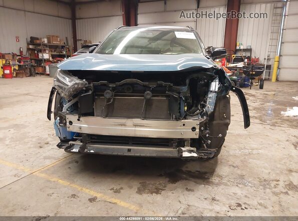 JTME6RFV6PD536837 2023 TOYOTA RAV4 HYBRID Blue Vista interior trasera