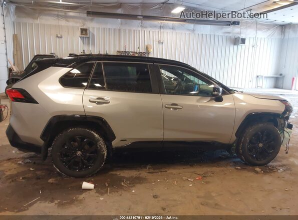 JTME6RFV7NJ019464 2022 TOYOTA RAV4 HYBRID Silver Вид задньої частини салону