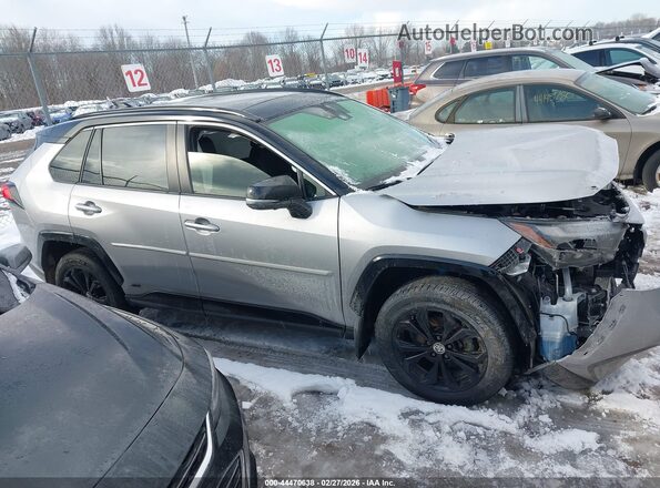 JTME6RFVXRD566717 2024 TOYOTA RAV4 HYBRID Silver Вид задньої частини салону