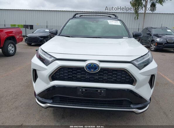 JTMEB3FVXRD209398 2024 TOYOTA RAV4 PRIME White Vista interior trasera