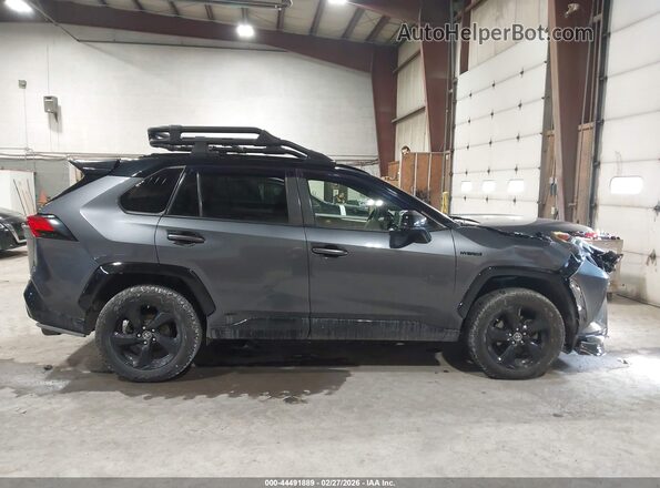 JTMEWRFV7KD504326 2019 TOYOTA RAV4 HYBRID Gray Rear interior view