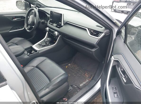 JTMEWRFVXKJ019860 2019 TOYOTA RAV4 HYBRID Серебряный Вид салона спереди