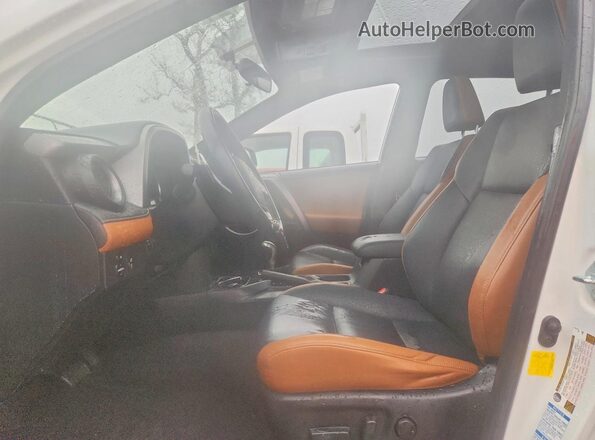 JTMJFREV2GD180032 2016 TOYOTA RAV4 White Front interior view