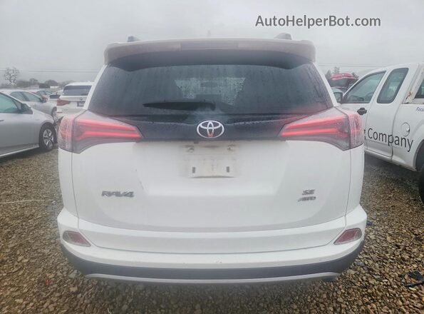 JTMJFREV2GD180032 2016 TOYOTA RAV4 White Rear view