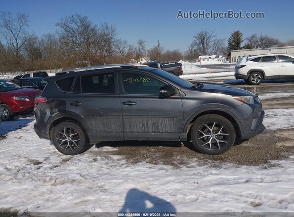 JTMJFREV6GD186867 2016 TOYOTA RAV4 Gray Vista interior trasera
