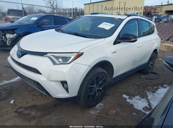 JTMJJREV2HD097975 2017 TOYOTA RAV4 HYBRID White წინა მარცხენა ხედი სამი მეოთხედიდან